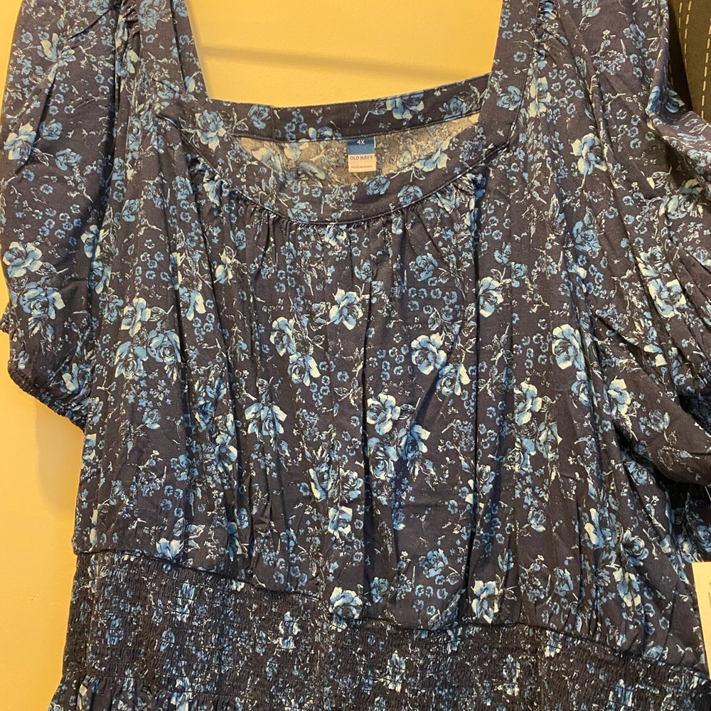 Old navy smocked waisted dress. Elastic sleeves Blue with white flowers.